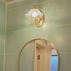 Clear Glass Floral Vanity Light with Gold Arc Arm for Bathroom