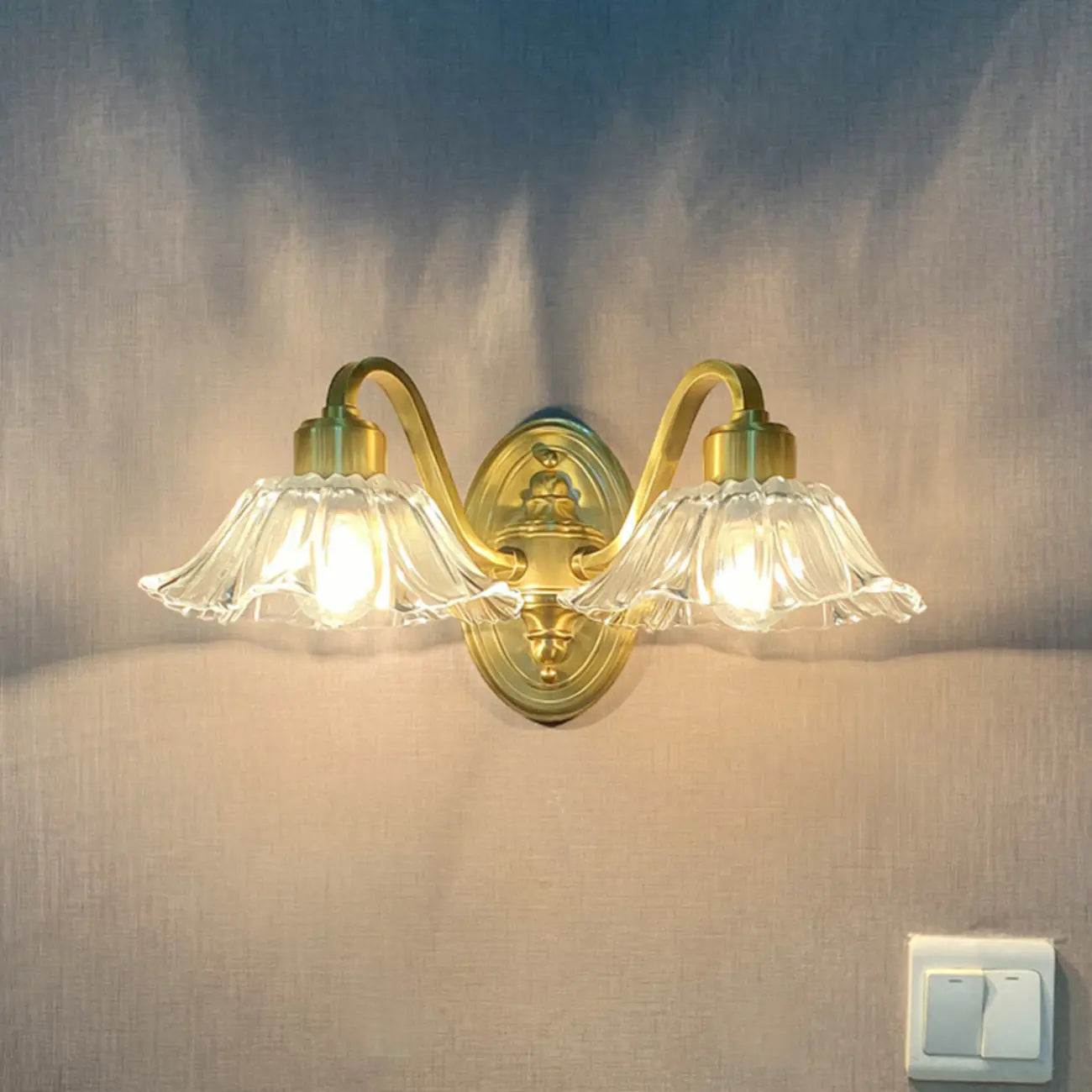 Clear Glass Floral Vanity Light with Gold Arc Arm for Bathroom