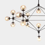 Industrial Black Globe Chandelier with Cognac Glass Shades