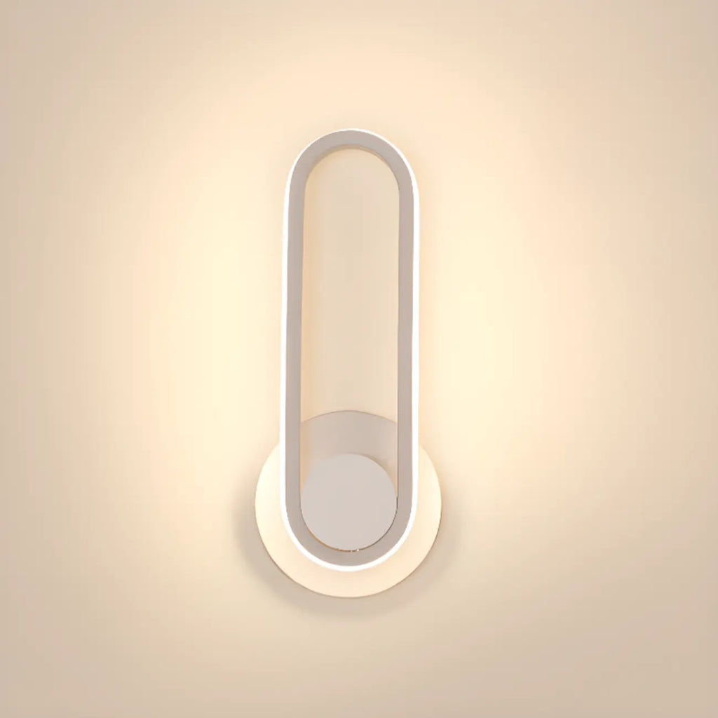 Minimalist LED Wall Sconce with Metal Finish for Bedroom