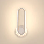 Minimalist LED Wall Sconce with Metal Finish for Bedroom