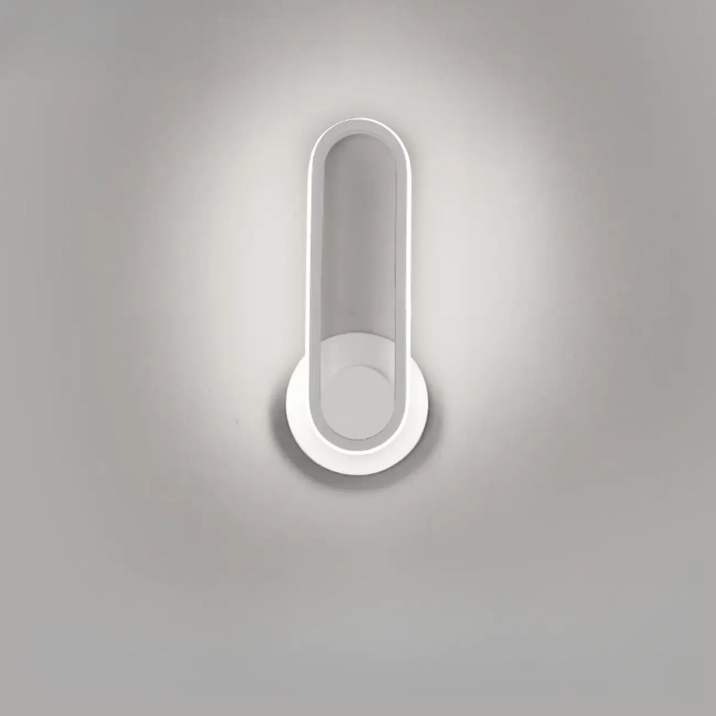 Minimalist LED Wall Sconce with Metal Finish for Bedroom