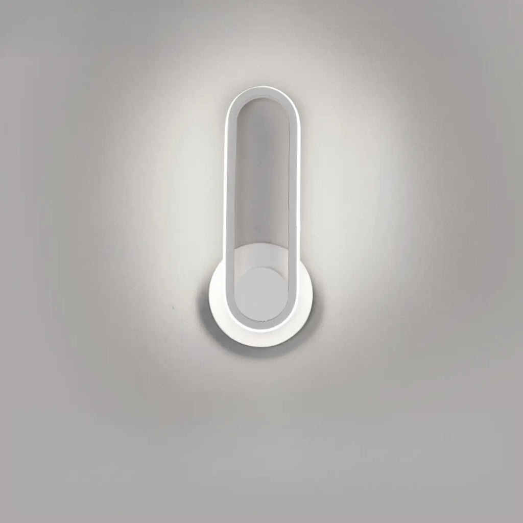 Minimalist LED Wall Sconce with Metal Finish for Bedroom