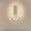 Minimalist LED Wall Sconce with Metal Finish for Bedroom