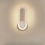 Minimalist LED Wall Sconce with Metal Finish for Bedroom